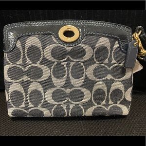 Coach fabric wristlet- denim, lilac lining.  7.5” l and 5.5”h.